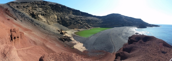 Lago Verde, Lanzarote. A green lagoon in the middle of a volcanic landscape.